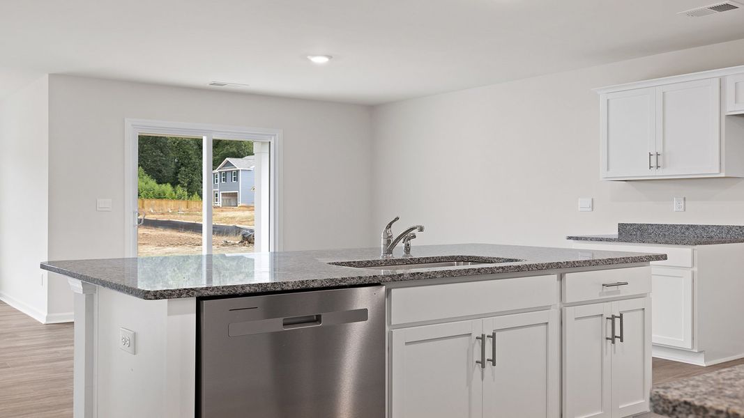 Furnished interior view inside a new home in Bentley Park, Greenwood (Image 5).