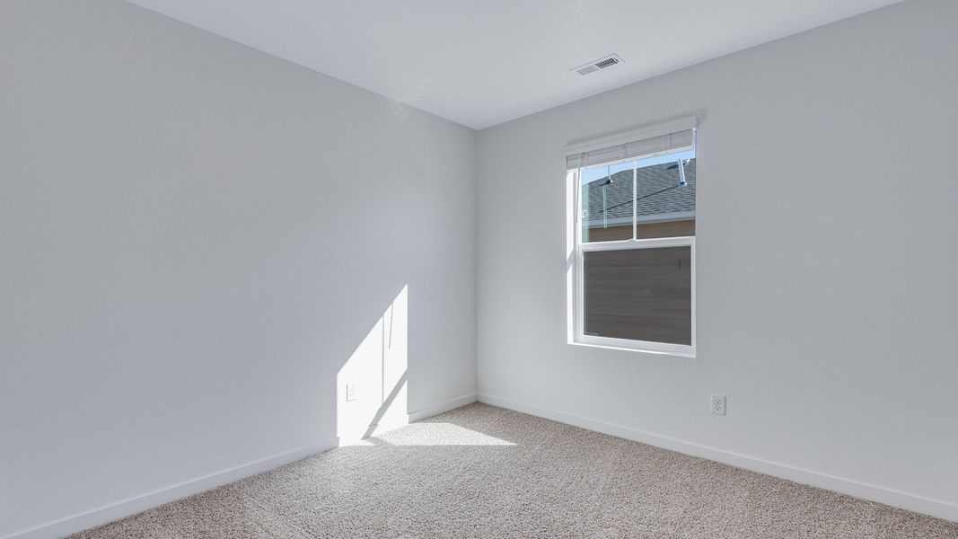 Spacious, unfurnished interior of a new home in Sky Ranch, Watkins (Image 14).