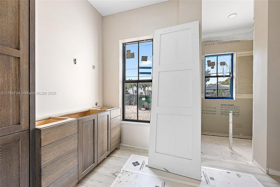 Furnished interior view inside a new home in , Tequesta (Image 12).