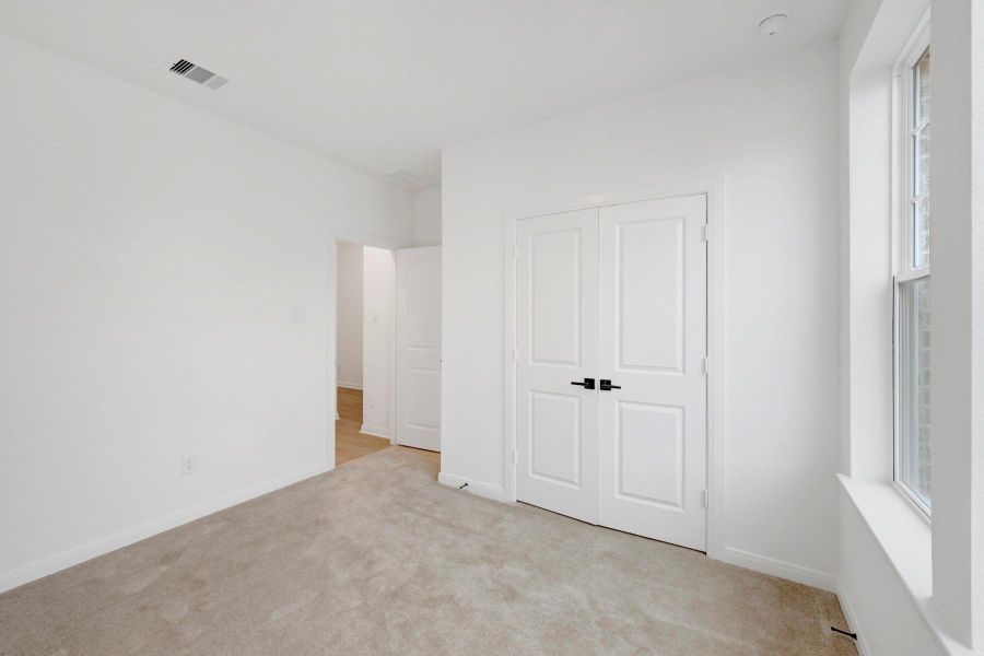 Spacious, unfurnished interior of a new home in The Grand Prairie 50’, Hockley (Image 30).