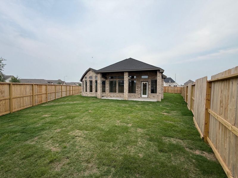 Exterior details and patio area of a home in Candela, Richmond (Image 3).