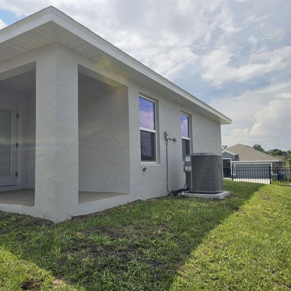 Exterior details and patio area of a home in Magnolia Park, Haines City (Image 26).