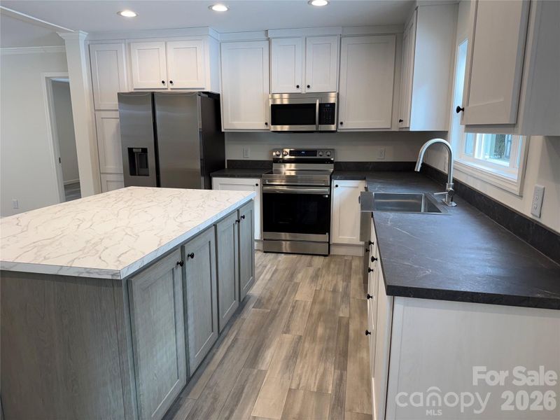 Furnished interior view inside a new home in , Statesville (Image 3).
