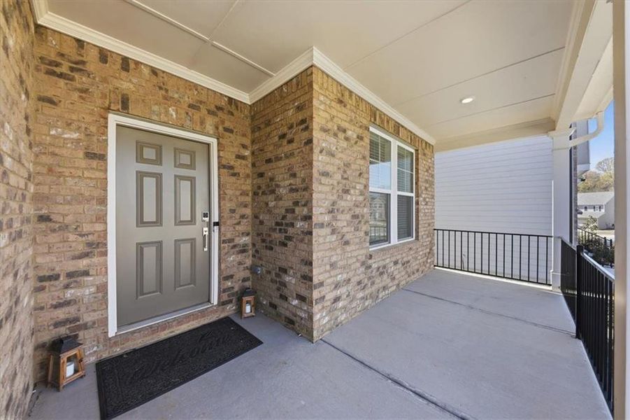 Exterior details and patio area of a home in Falls Creek, Flowery Branch (Image 33).