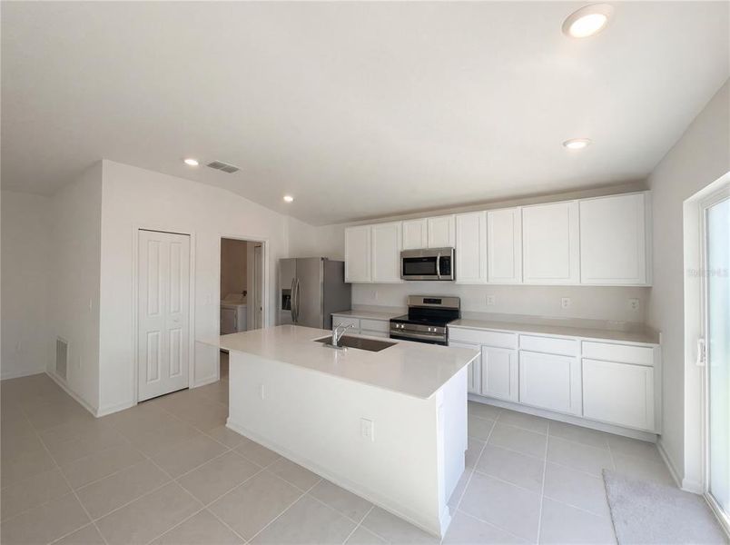 Furnished interior view inside a new home in Peace Creek Reserve, Winter Haven (Image 9).