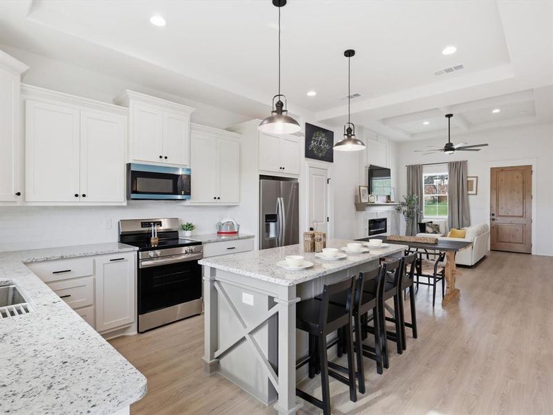 This kitchen beautifully flows into the living room so your conversations and connections aren't hindered.