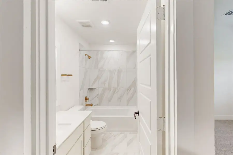 Furnished interior view inside a new home in Sorella, Tomball (Image 6).