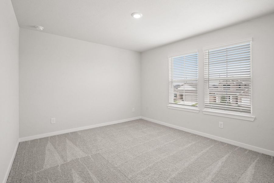 Spacious, unfurnished interior of a new home in Sunterra, Katy (Image 19).
