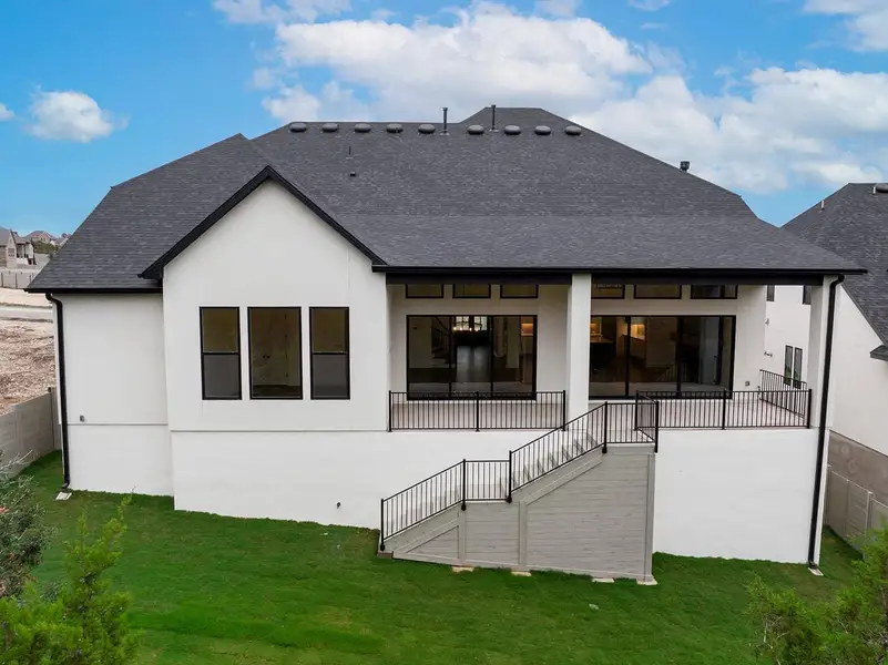 Exterior details and patio area of a home in Wolf Ranch West Bend - 70', Georgetown (Image 2). Exterior details and patio area of a home in Wolf Ranch West Bend - 70', Georgetown (Image 2).