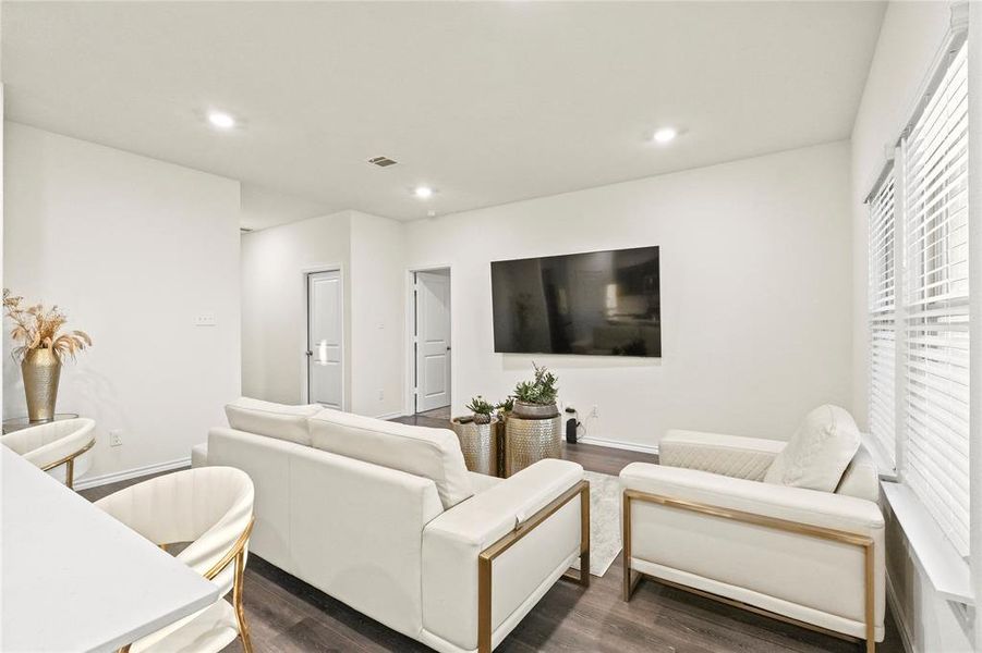 Living room featuring dark hardwood / wood-style floors