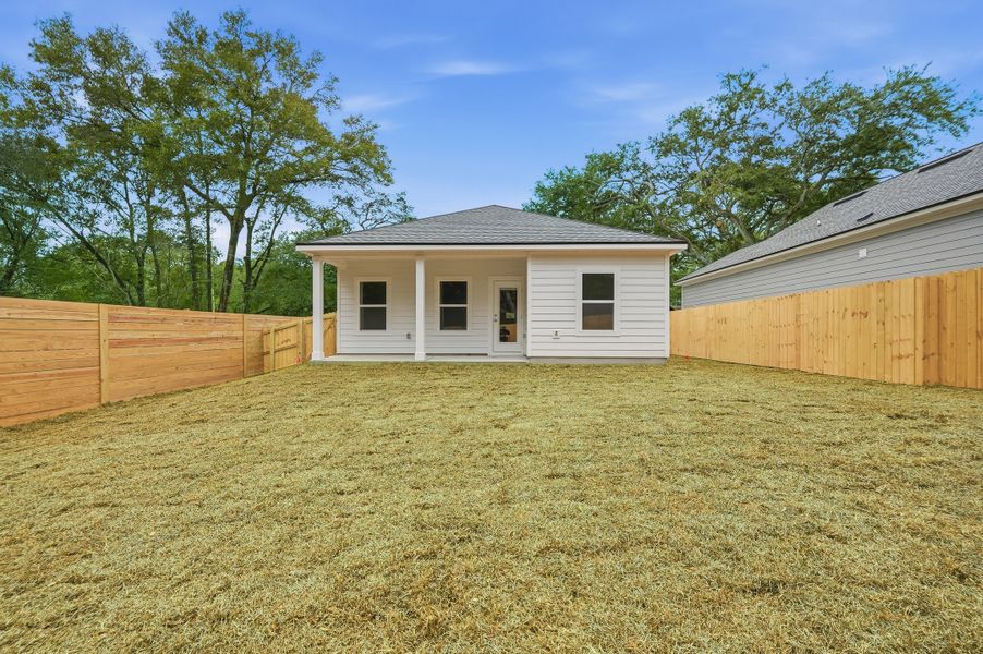 Exterior details and patio area of a home in Live Oak Cottages, Freeport (Image 25). Exterior details and patio area of a home in Live Oak Cottages, Freeport (Image 25).