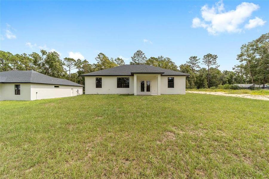 Exterior details and patio area of a home in , Ocala (Image 28).