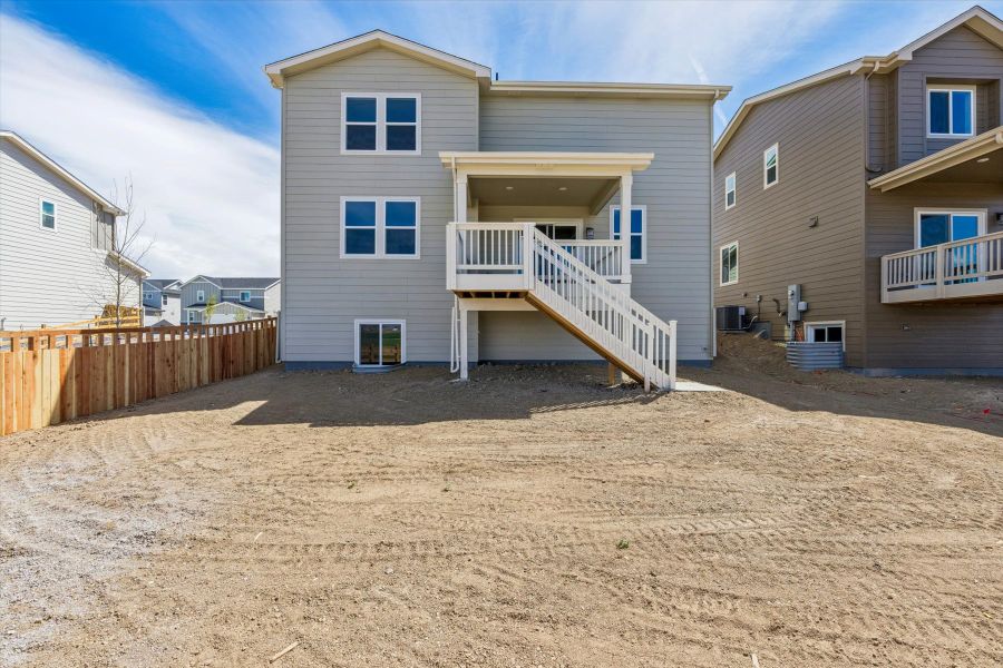 A house with a deck. A house with a deck.