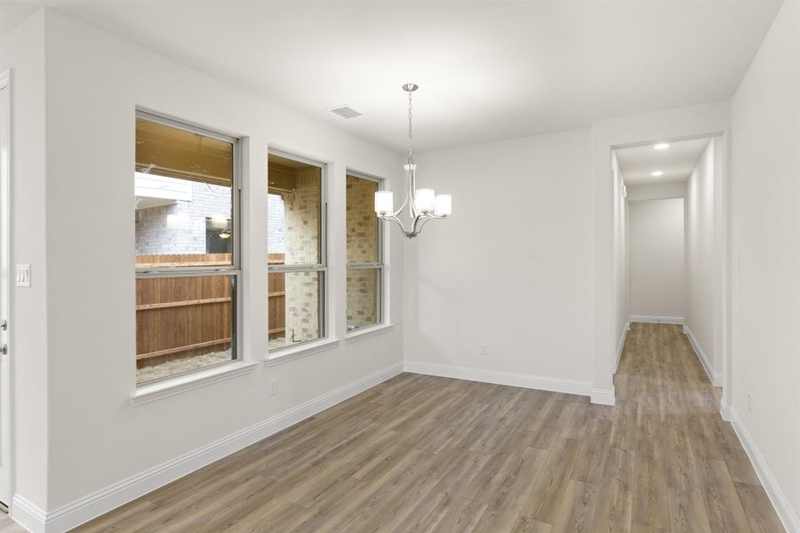 Representative unfurnished interior of a home built from the Juniper by UnionMain Homes in Edgewater, Fate (Image 26).