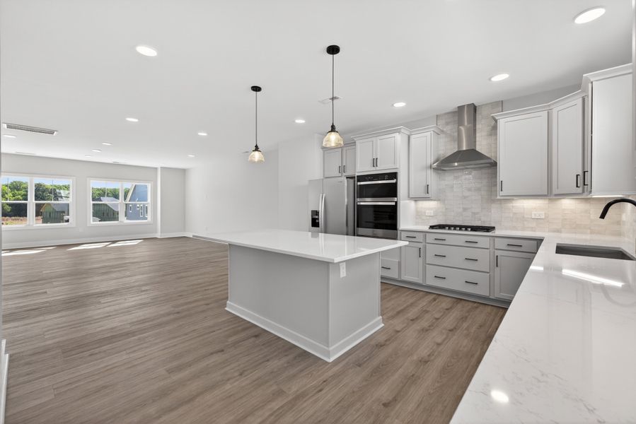 Representative furnished interior of a home built from the Atlas Interior Unit by Baker Residential in Atwater Station - Midtown Collection, Fuquay Varina (Image 8).
