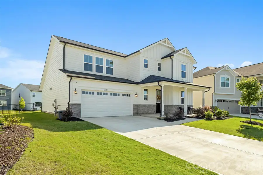 Front exterior of a new home in Waxhaw Landing, Monroe, NC, highlighting curb appeal (Image 1). Front exterior of a new home in Waxhaw Landing, Monroe, NC, highlighting curb appeal (Image 1).