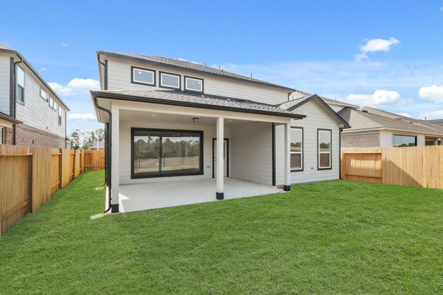 Exterior details and patio area of a home in Barton Creek Ranch, Conroe (Image 4). Exterior details and patio area of a home in Barton Creek Ranch, Conroe (Image 4).