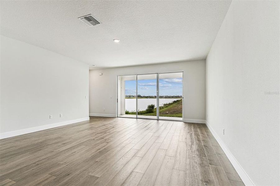 Spacious, unfurnished interior of a new home in The Peninsula at Rhodine Lake, Riverview (Image 32).