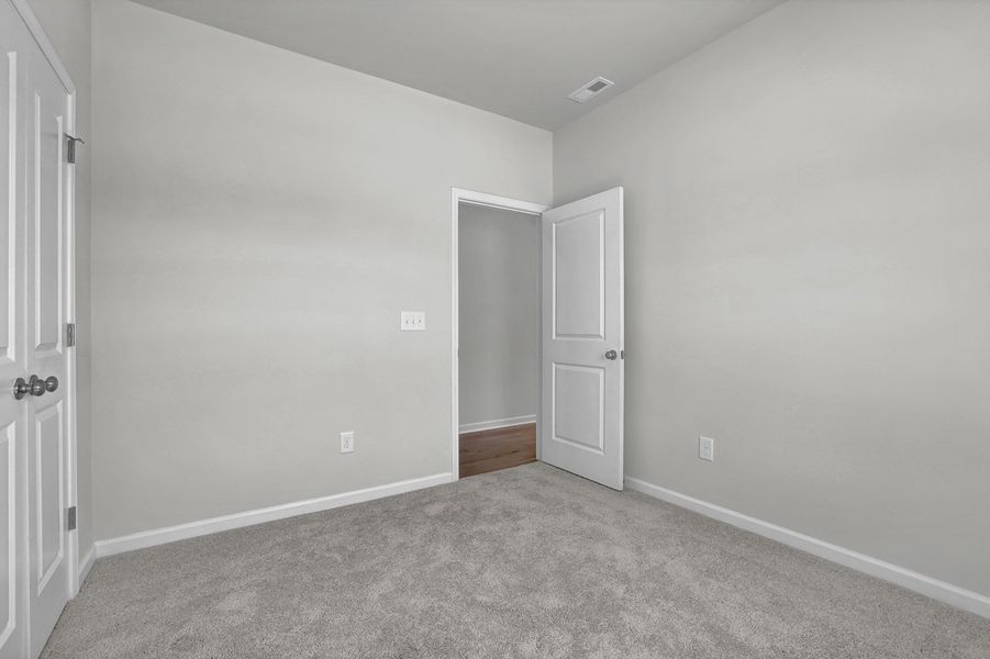Spacious, unfurnished interior of a new home in River Tide Farms, Bolivia (Image 23).