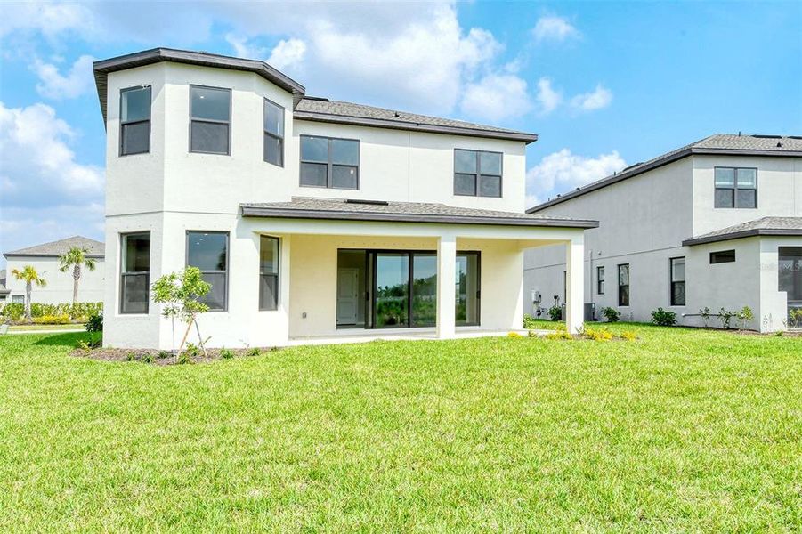 Front exterior of a new home in , Nokomis, FL, highlighting curb appeal (Image 23).