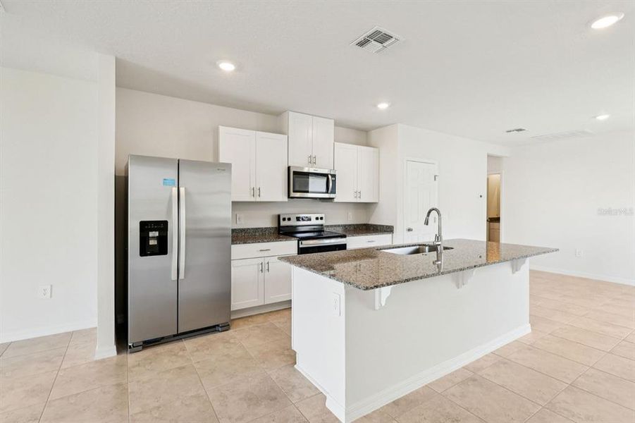 Furnished interior view inside a new home in Springs at Lake Alfred - Classic Series, Lake Alfred (Image 6).