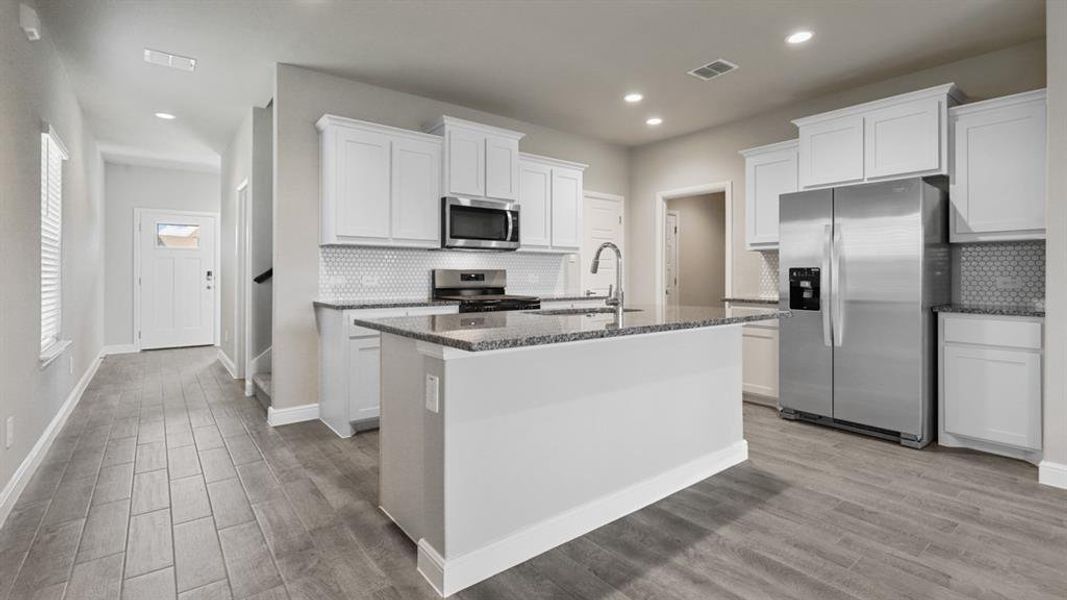 Kitchen - All Home and community information, including pricing, included features, terms, availability and amenities, are subject to change at any time without notice or obligation. All Drawings, pictures, photographs, video, square footages, floor plans, elevations, features, colors and sizes are approximate for illustration purposes only and will vary from the homes as built. Kitchen - All Home and community information, including pricing, included features, terms, availability and amenities, are subject to change at any time without notice or obligation. All Drawings, pictures, photographs, video, square footages, floor plans, elevations, features, colors and sizes are approximate for illustration purposes only and will vary from the homes as built.