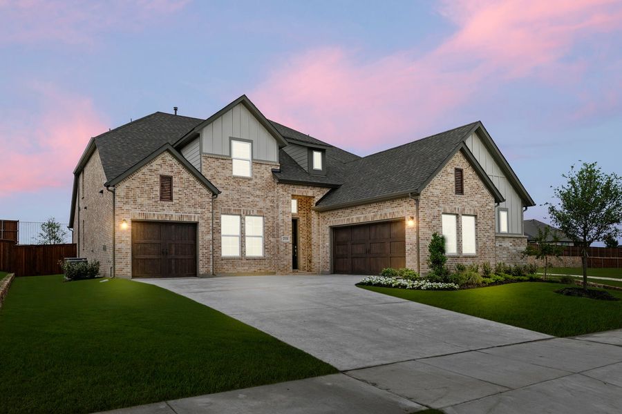 Front exterior of a new home in Nelson Lake Estates, Rockwall, TX, highlighting curb appeal (Image 2).