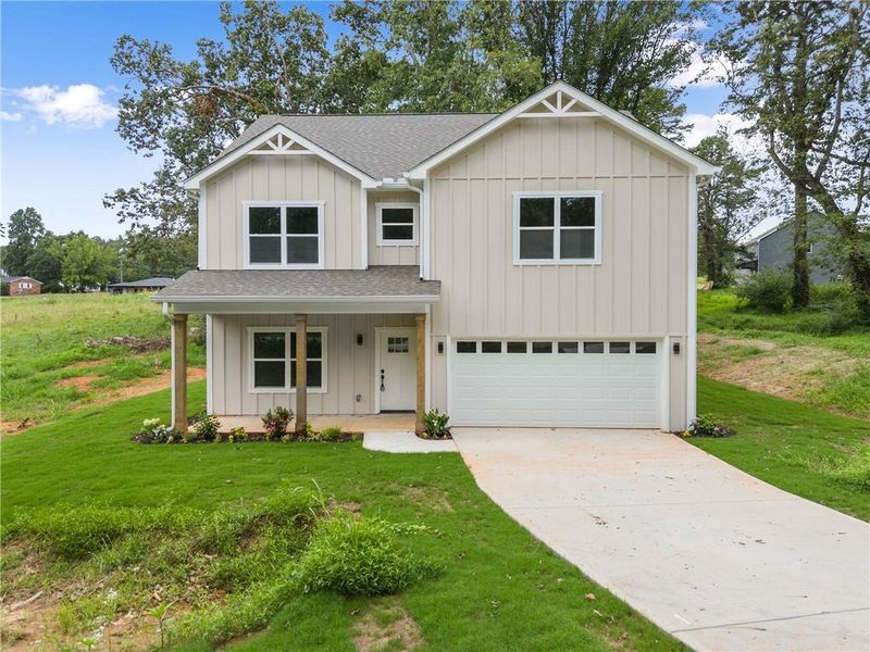 Front exterior of a new home in , Clarkesville, GA, highlighting curb appeal (Image 25). Front exterior of a new home in , Clarkesville, GA, highlighting curb appeal (Image 25).