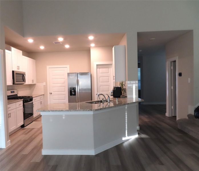 Furnished interior view inside a new home in Sierra Vista, Iowa Colony (Image 7).