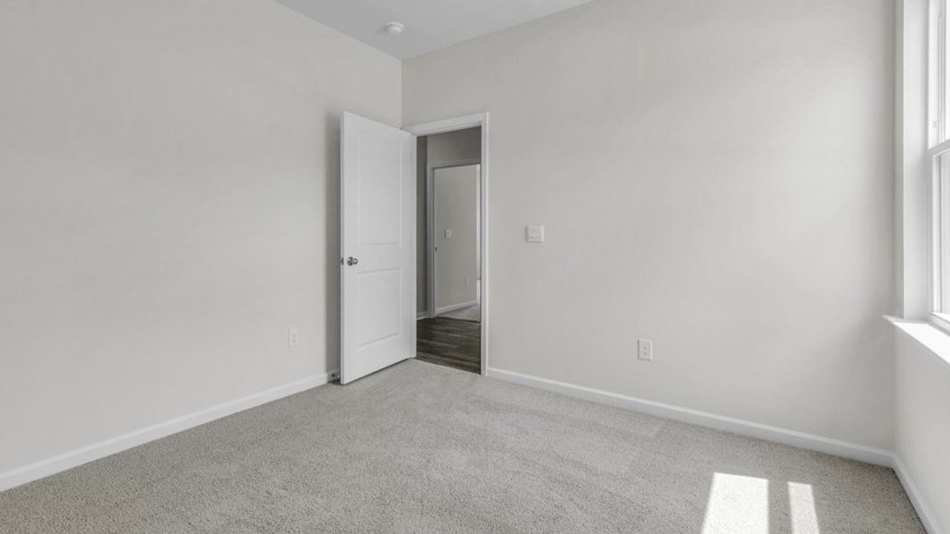 Spacious, unfurnished interior of a new home in Villa Grande, Winterville (Image 26).