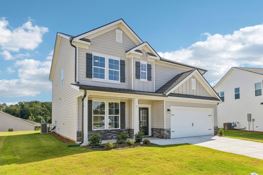 Front exterior of a new home in Sutton’s Landing, Statham, GA, highlighting curb appeal (Image 23).