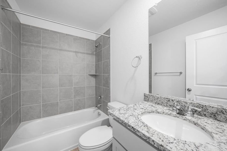 Furnished interior view inside a new home in Longview 40s, Del Valle (Image 7).