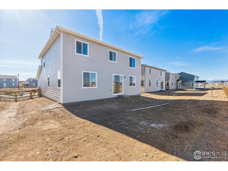 Exterior details and patio area of a home in Prairie Song, Windsor (Image 4).