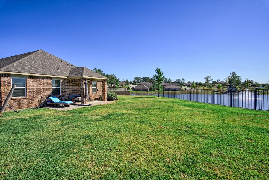 Exterior details and patio area of a home in Wedgewood Forest, Conroe (Image 3). Exterior details and patio area of a home in Wedgewood Forest, Conroe (Image 3).