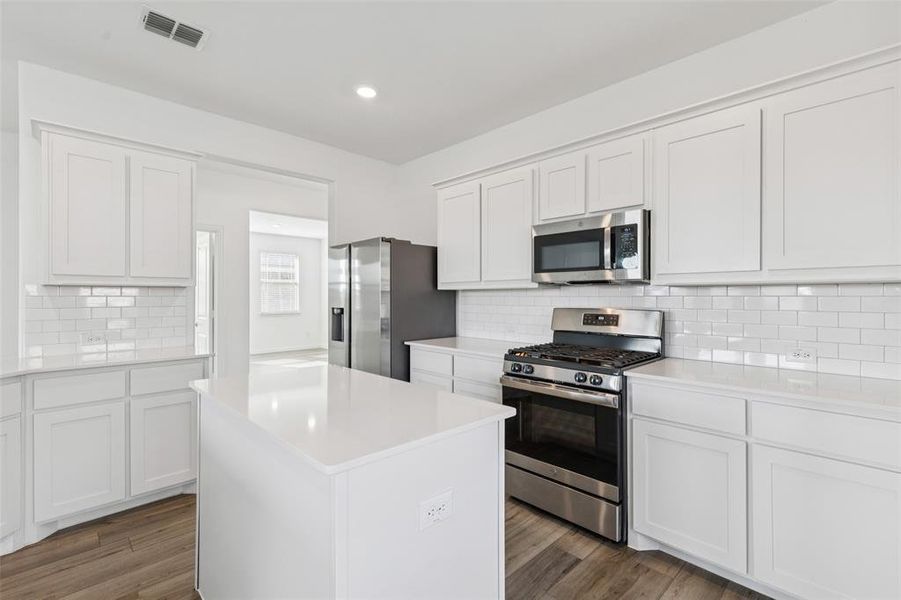 Furnished interior view inside a new home in Linden Hills: Classic Collection, Little Elm (Image 11). Furnished interior view inside a new home in Linden Hills: Classic Collection, Little Elm (Image 11).