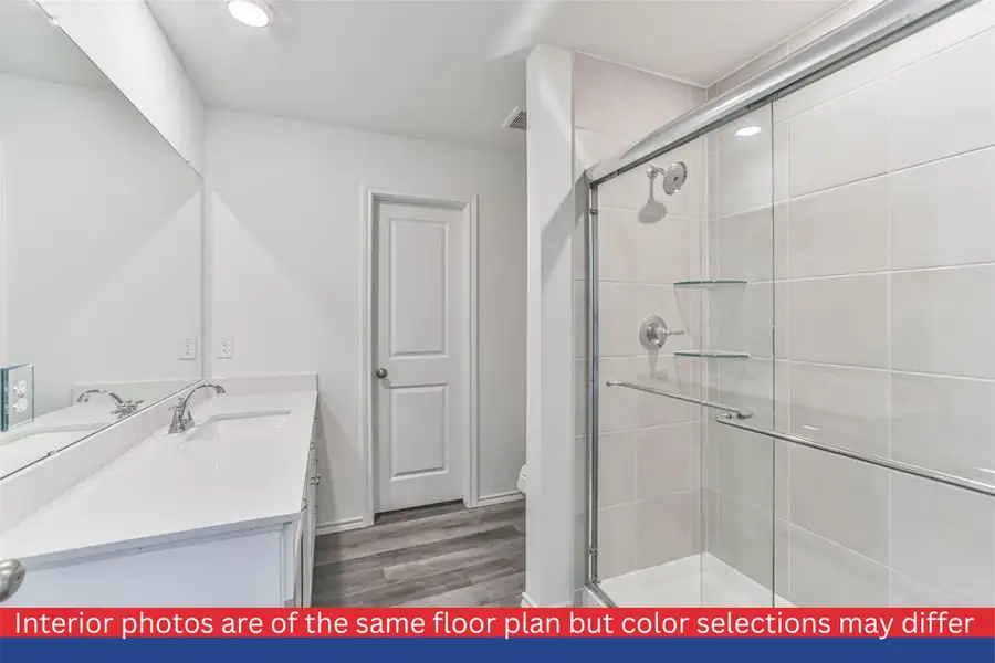 The second bathroom is tastefully designed and easily accessible from the main living areas and bedrooms. It features a modern vanity, a bathtub/shower combination, and stylish fixtures. The second bathroom is tastefully designed and easily accessible from the main living areas and bedrooms. It features a modern vanity, a bathtub/shower combination, and stylish fixtures.