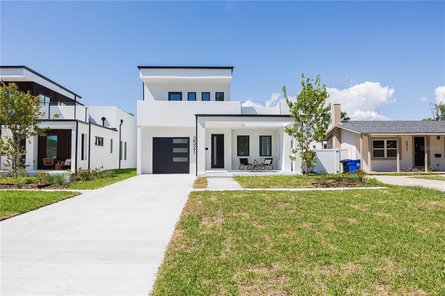 Front exterior of a new home in , St. Petersburg, FL, highlighting curb appeal (Image 28).