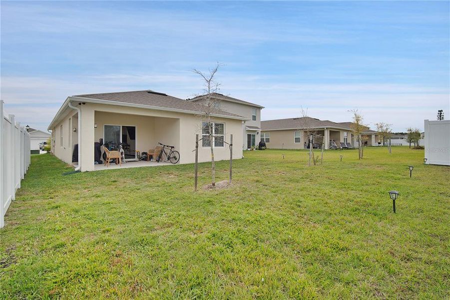 Exterior details and patio area of a home in Kindred, Kissimmee (Image 4).
