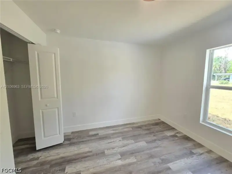 Spacious, unfurnished interior of a new home in , Port Charlotte (Image 18).