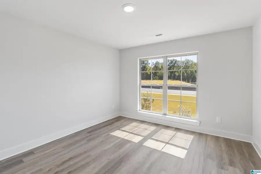 Representative unfurnished interior of a home built from the 3000 by Adams Homes in Flagler Estates, Hastings (Image 29).