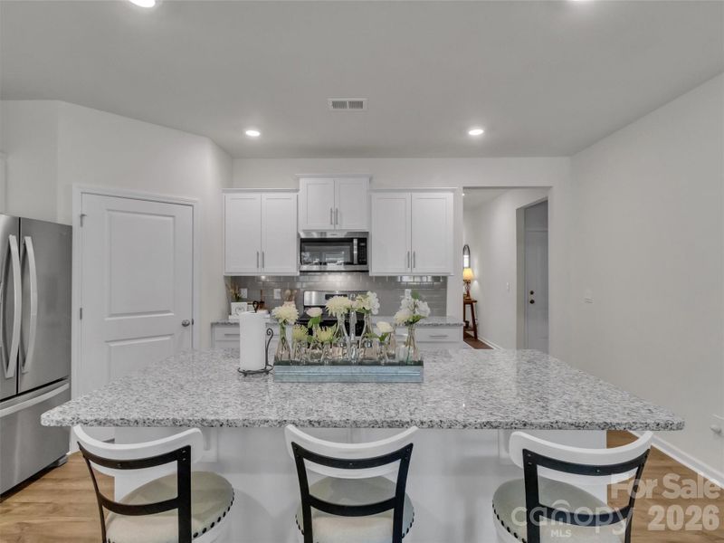 Furnished interior view inside a new home in , Waynesville (Image 7).
