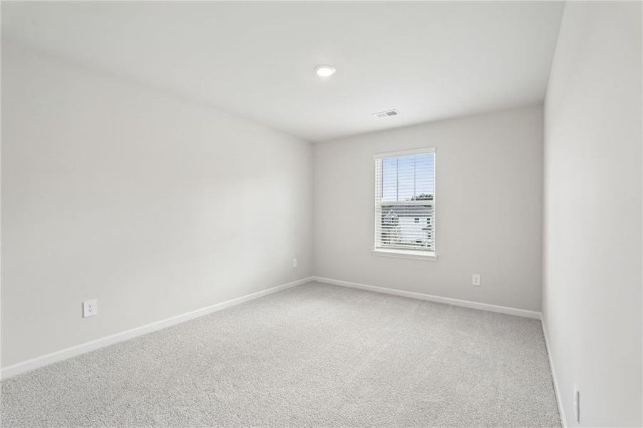 Spacious, unfurnished interior of a new home in Northwoods at Mirror Lake, Villa Rica (Image 36).