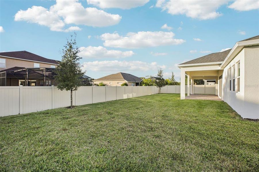 Exterior details and patio area of a home in Hawk's Overlook, Oviedo (Image 25).