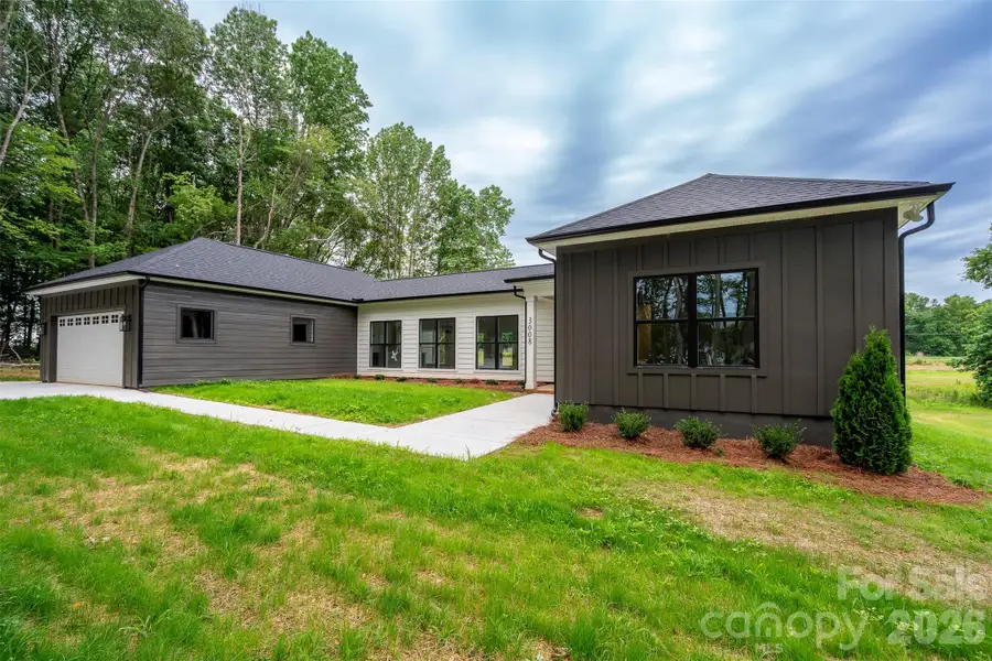 Exterior details and patio area of a home in , Monroe (Image 3).