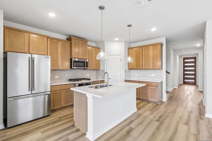 Furnished interior view inside a new home in Stream Waters, Seguin (Image 4).