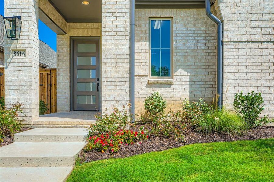 Doorway to property with brick siding Doorway to property with brick siding