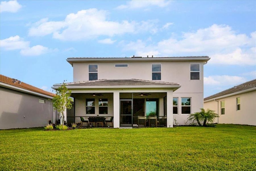 Front exterior of a new home in Sunstone at Wellen Park, Venice, FL, highlighting curb appeal (Image 24).