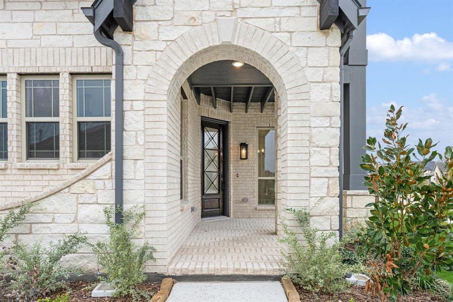 Exterior details and patio area of a home in Windsong Ranch Classic 61, Prosper (Image 18). Exterior details and patio area of a home in Windsong Ranch Classic 61, Prosper (Image 18).