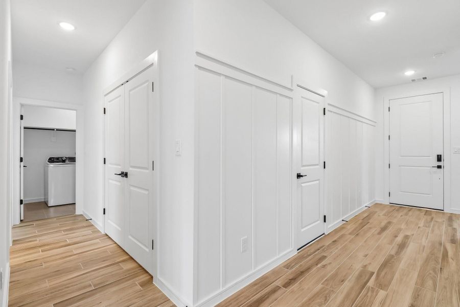 Inviting foyer with decorative feature wall