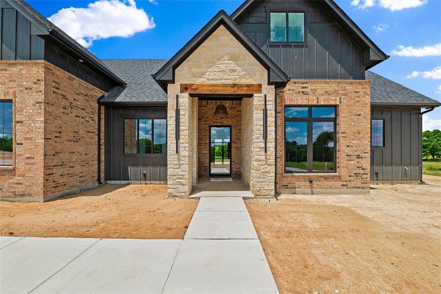 Exterior details and patio area of a home in , Poolville (Image 3). Exterior details and patio area of a home in , Poolville (Image 3).